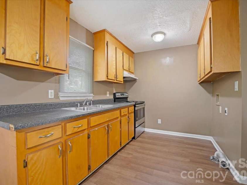 100 Gilmer Street, Gastonia, NC 28052.  MLS# CAR4399181, YatesRealty ID 35124. Kitchen
