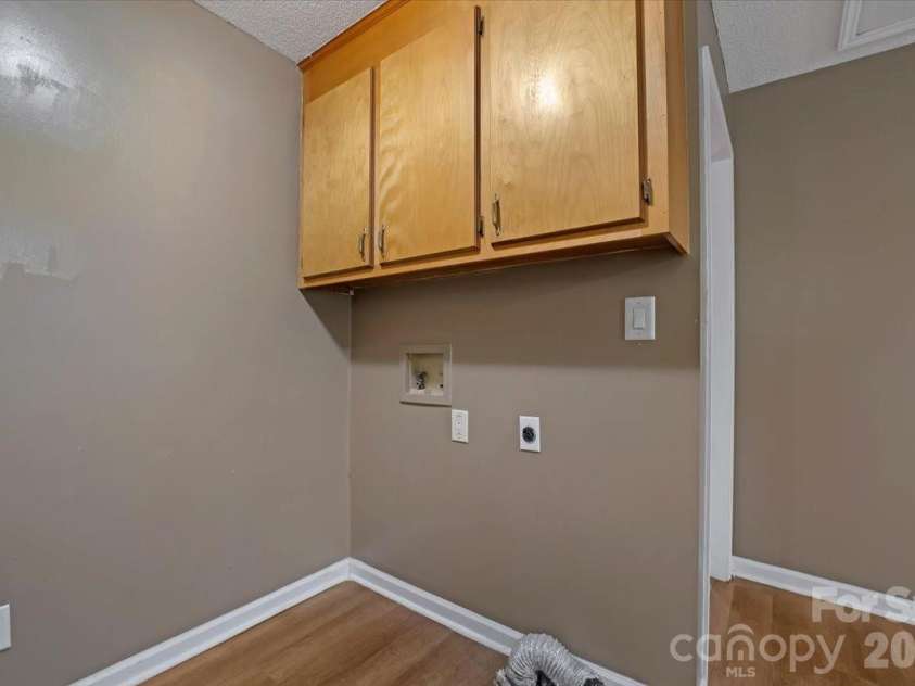 100 Gilmer Street, Gastonia, NC 28052.  MLS# CAR4399181, YatesRealty ID 35124. Laundry in Kitchen area