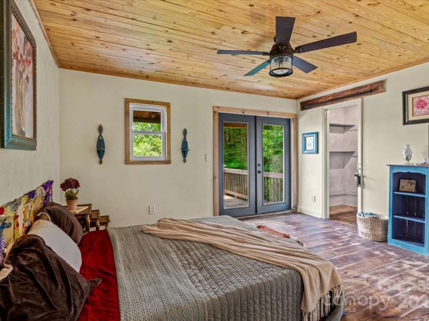 724 Teeter Road, Mooresville, NC 28115.  MLS# CAR4276368, YatesRealty ID 35132. Primary Bedroom with access to the deck