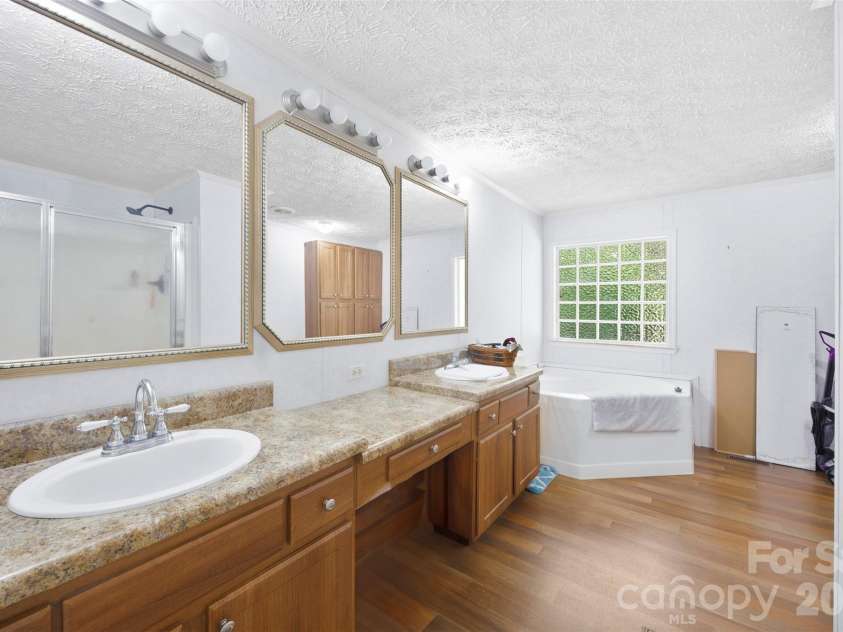 124 Lee Street, Richfield, NC 28137.  MLS# CAR4399770, YatesRealty ID 35135. Primary Bathroom