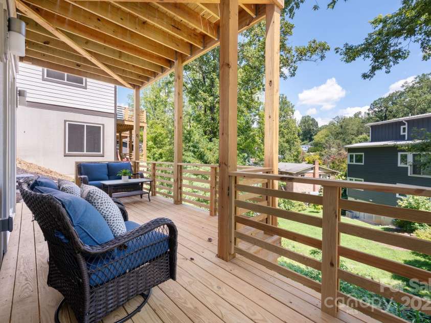 5 Orrinel Way, Asheville, NC 28806.  MLS# CAR4294195, YatesRealty ID 35139. Lower Level Deck Abuts Green Space