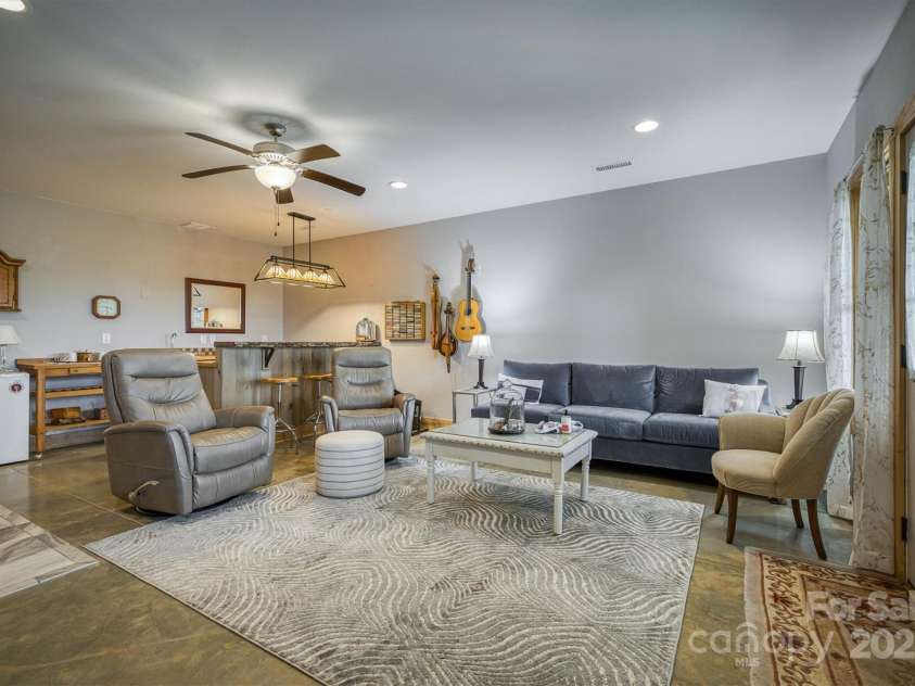 381 Scenic Overlook Drive, Nebo, NC 28761.  MLS# CAR4294911, YatesRealty ID 3514. Basement Den