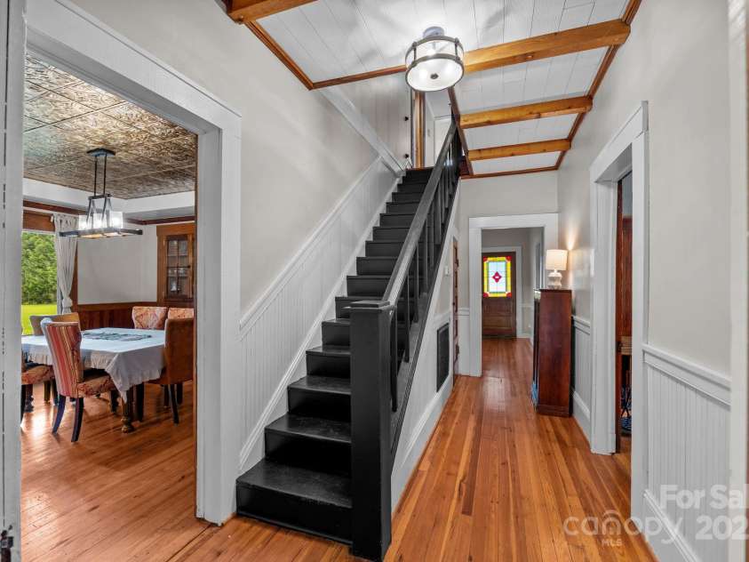 8900 Old Concord Road, Salisbury, NC 28146.  MLS# CAR4295325, YatesRealty ID 35140. Staircase-let's head upstairs!