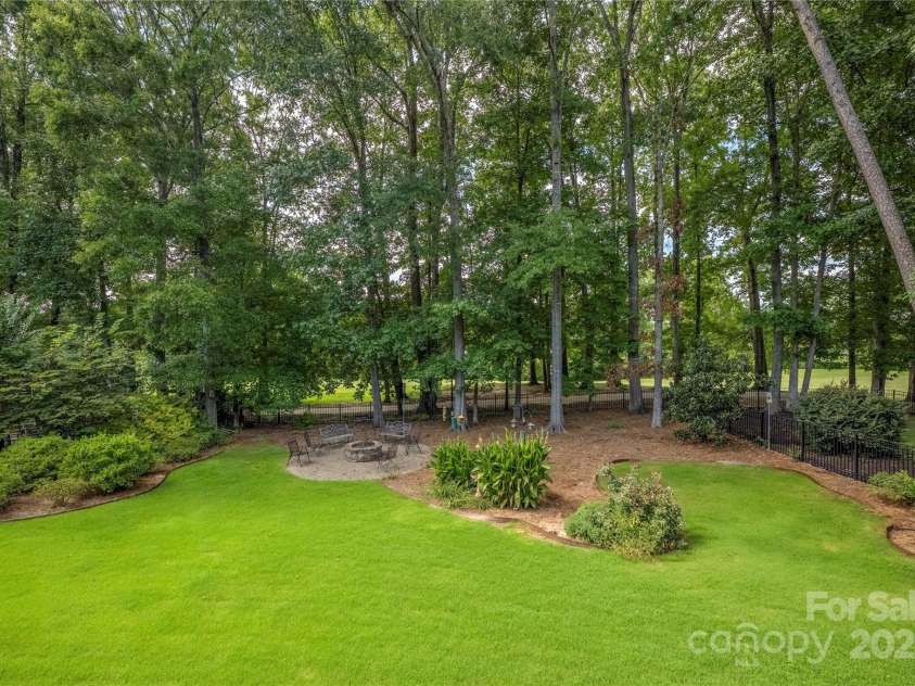 9603 Devonshire Drive, Huntersville, NC 28078.  MLS# CAR4292851, YatesRealty ID 35141. .37 acres backing up to hole #8 is the perfect backyard for playing, entertaining... even a pool!