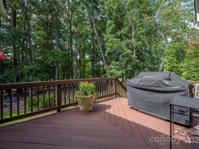 9603 Devonshire Drive, Huntersville, NC 28078.  MLS# CAR4292851, YatesRealty ID 35141. Deck extension off the screend porch creates the perfect grilling spot.