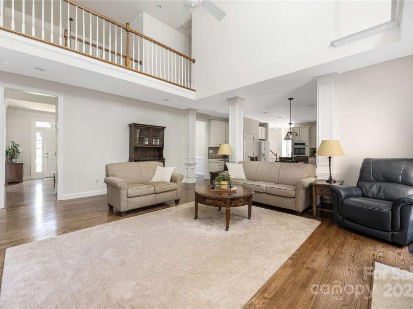 9603 Devonshire Drive, Huntersville, NC 28078.  MLS# CAR4292851, YatesRealty ID 35141. Fresh interior paint (SW Incredible White 8/2025).  Two story family room with wonderful natural light.  Real hardwoods that have been refinsished (2019).