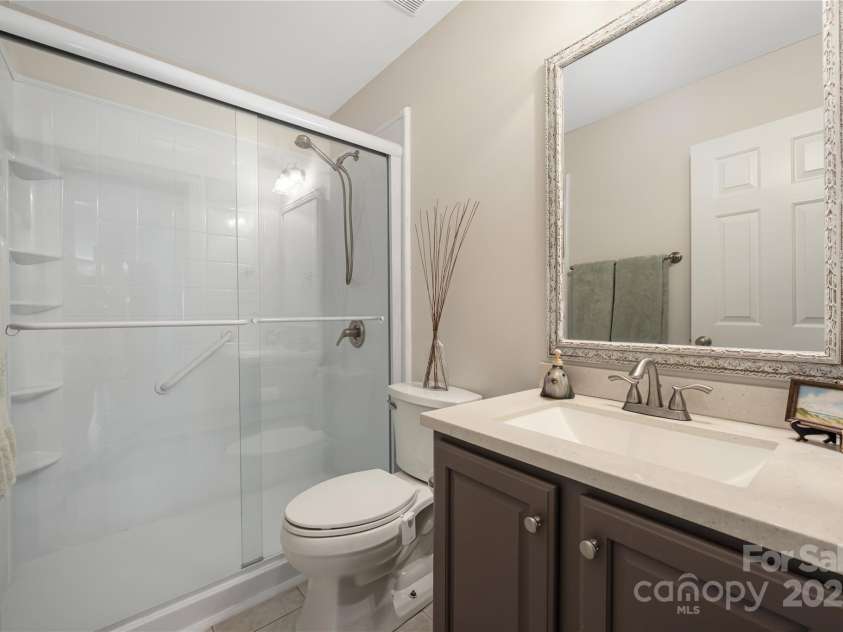 9603 Devonshire Drive, Huntersville, NC 28078.  MLS# CAR4292851, YatesRealty ID 35141. Full bathroom right outside the guest room.