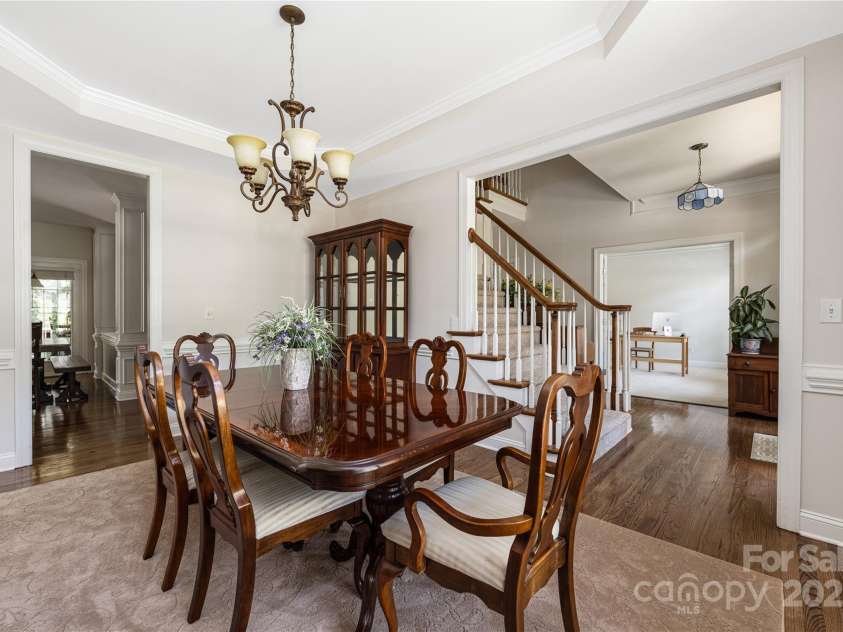 9603 Devonshire Drive, Huntersville, NC 28078.  MLS# CAR4292851, YatesRealty ID 35141. Good view of the wide and open foyer, home office, dining room with tray ceiling and view into kitchen and family room.