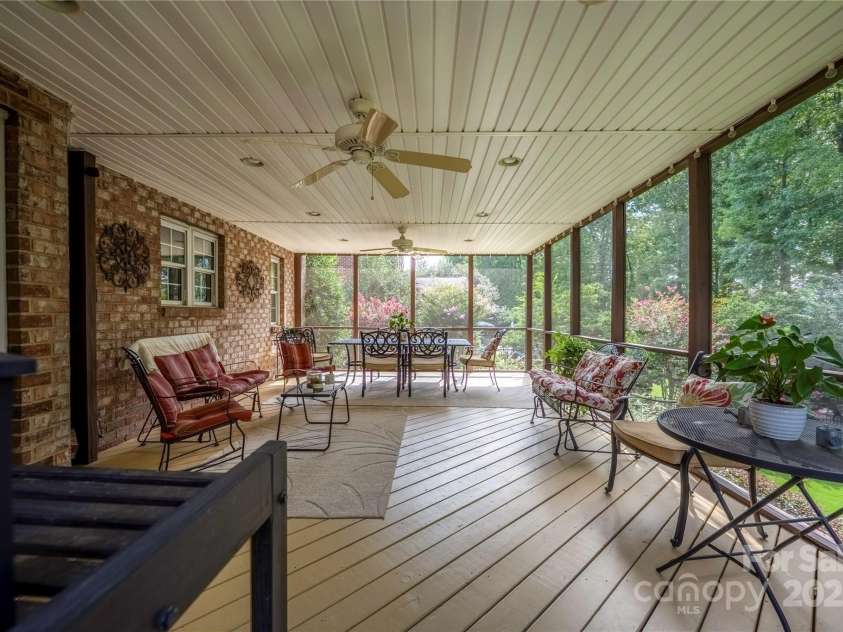 9603 Devonshire Drive, Huntersville, NC 28078.  MLS# CAR4292851, YatesRealty ID 35141. The porch extends the family room living and entertaining flow of the  home.