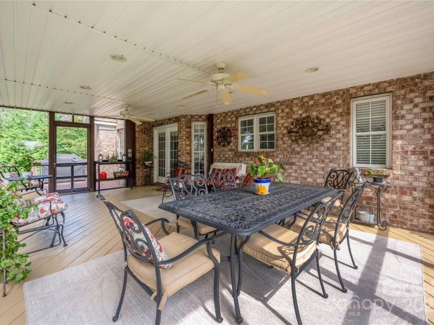9603 Devonshire Drive, Huntersville, NC 28078.  MLS# CAR4292851, YatesRealty ID 35141. You will LOVE the porch overlooking the golf course fairway hole #8.
