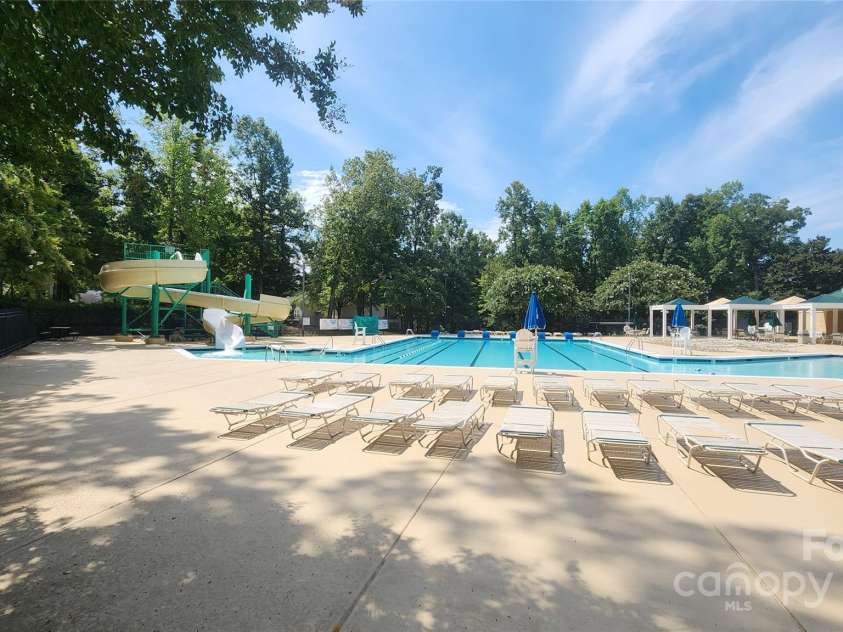 1805 Crabapple Tree Lane, Charlotte, NC 28214.  MLS# CAR4293333, YatesRealty ID 35144. A great community pool with slide and swim team