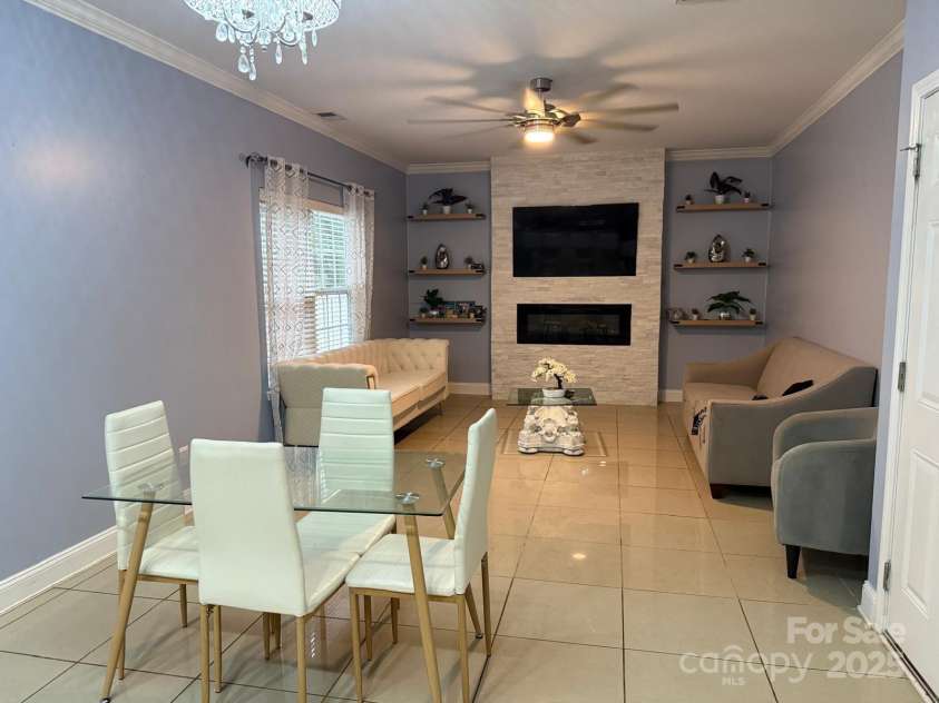 11001 Dulin Creek Boulevard, Charlotte, NC 28215.  MLS# CAR4287097, YatesRealty ID 35152. Living Room 