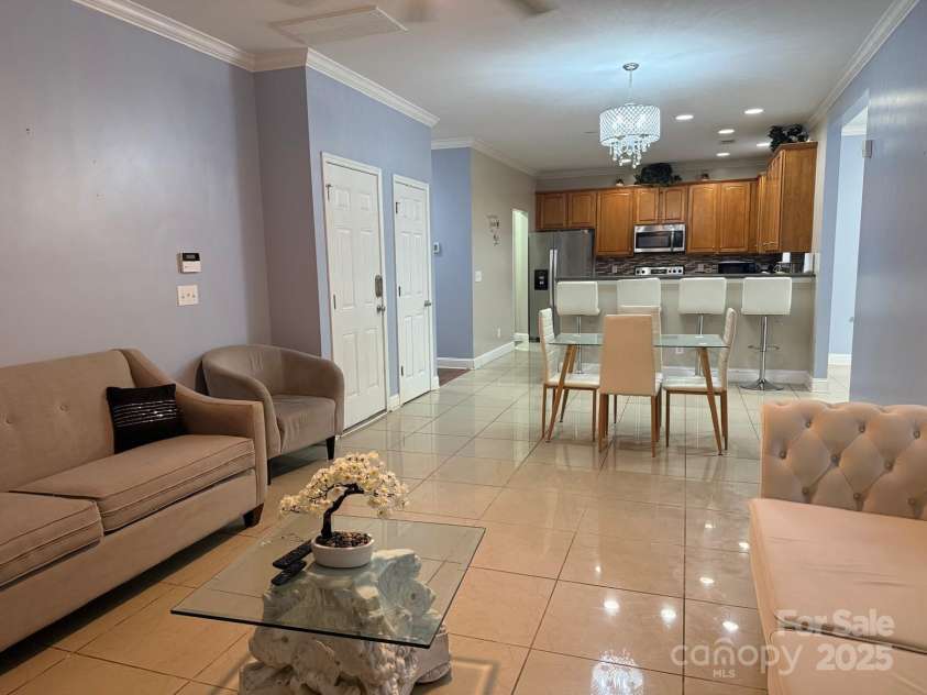 11001 Dulin Creek Boulevard, Charlotte, NC 28215.  MLS# CAR4287097, YatesRealty ID 35152. Living Room