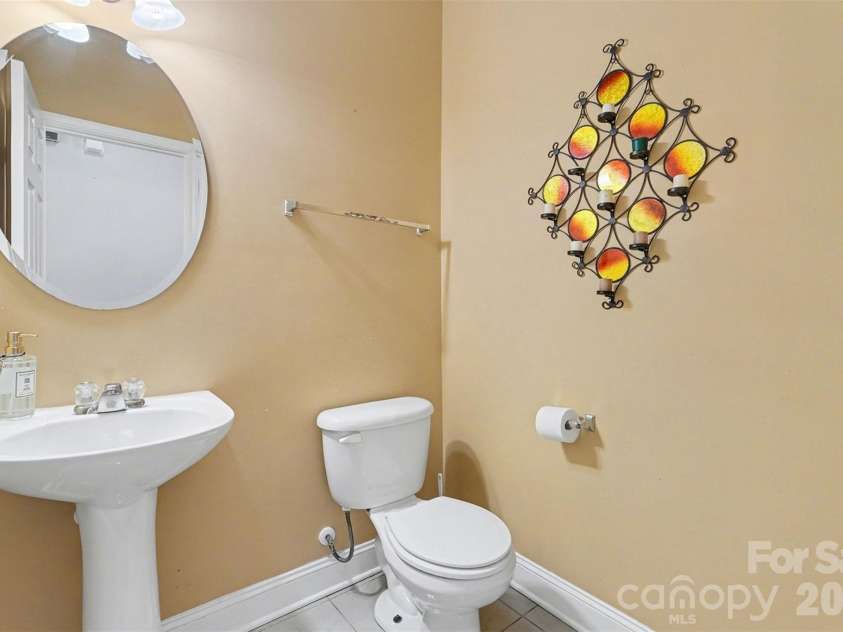 11001 Dulin Creek Boulevard, Charlotte, NC 28215.  MLS# CAR4287097, YatesRealty ID 35152. Powder Room Downstairs