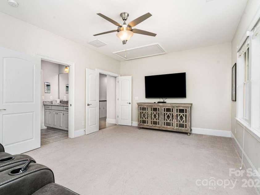 6211 Jepson Court, Charlotte, NC 28214.  MLS# CAR4293083, YatesRealty ID 35158. 3rd upstairs bedroom currently being used as a movie room. Attached Jack and Jill style bathroom to other secondary bedrooms upstairs.