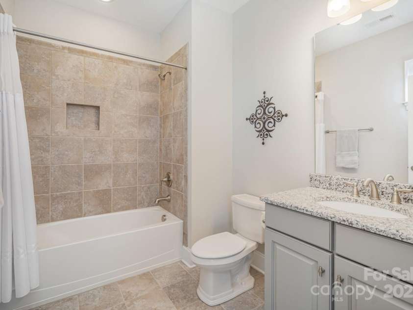 6211 Jepson Court, Charlotte, NC 28214.  MLS# CAR4293083, YatesRealty ID 35158. Attached bathroom in the secondary bedroom upstairs.
