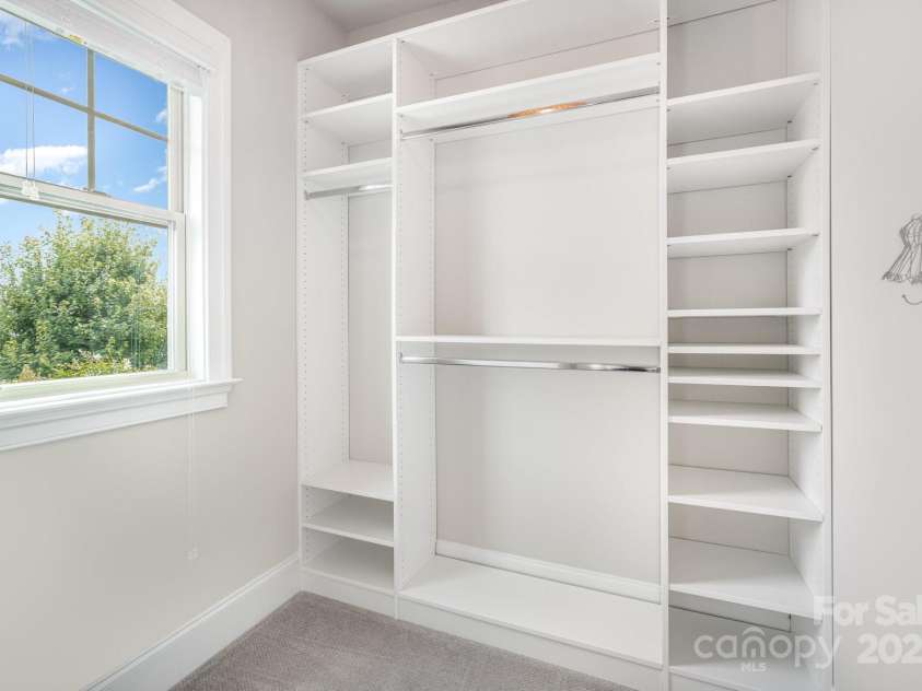 6211 Jepson Court, Charlotte, NC 28214.  MLS# CAR4293083, YatesRealty ID 35158. Custom built in shelving