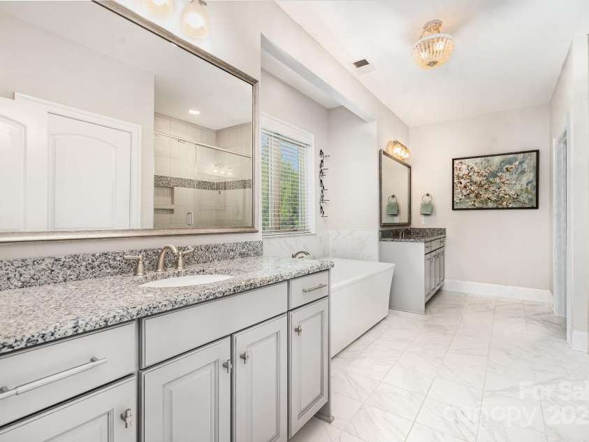 6211 Jepson Court, Charlotte, NC 28214.  MLS# CAR4293083, YatesRealty ID 35158. Double vanities in primary bathroom.