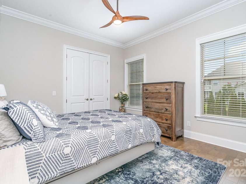 6211 Jepson Court, Charlotte, NC 28214.  MLS# CAR4293083, YatesRealty ID 35158. Downstairs guest room with built in shelves in closet and attached full bathroom.