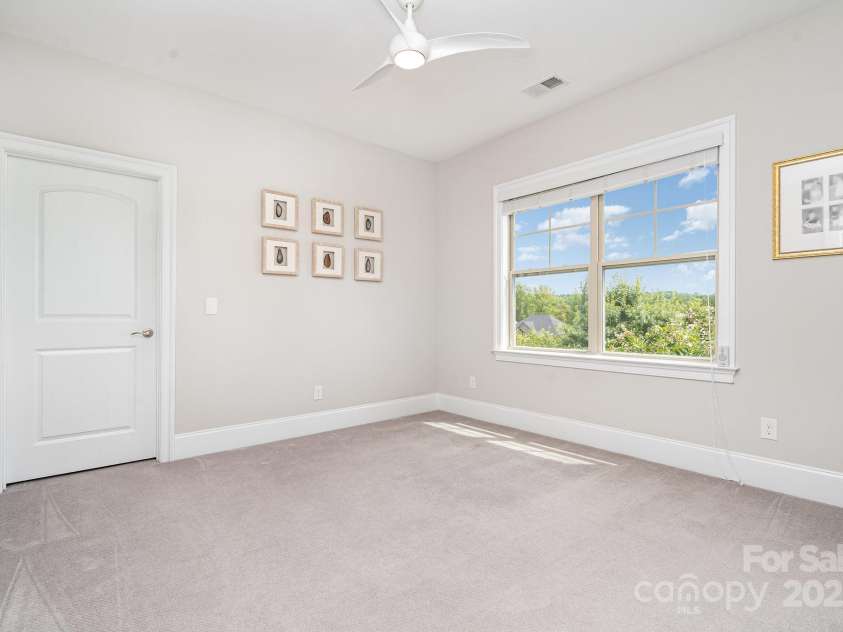 6211 Jepson Court, Charlotte, NC 28214.  MLS# CAR4293083, YatesRealty ID 35158. Second upstairs bedroom with attached bathroom.