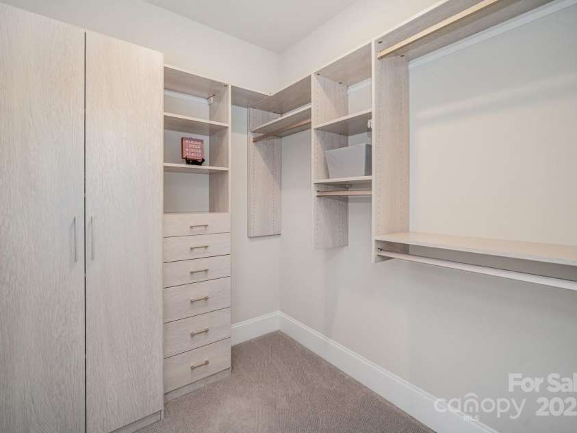 6211 Jepson Court, Charlotte, NC 28214.  MLS# CAR4293083, YatesRealty ID 35158. Walkin closet with custom built in shelving and cabinetry in third upsaris bedroom.