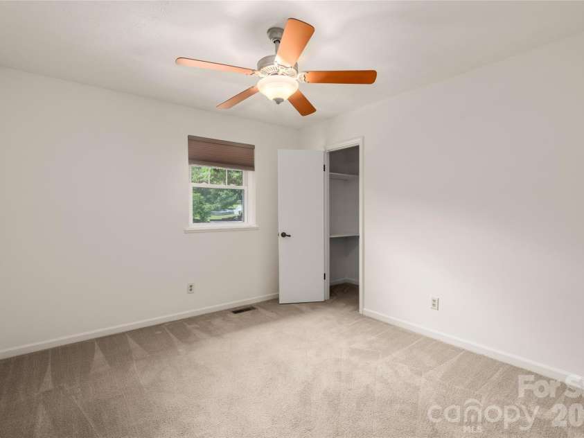 8 Wedgewood Drive, Mills River, NC 28759.  MLS# CAR4398096, YatesRealty ID 35159. Bedroom 3 with custom black out shade