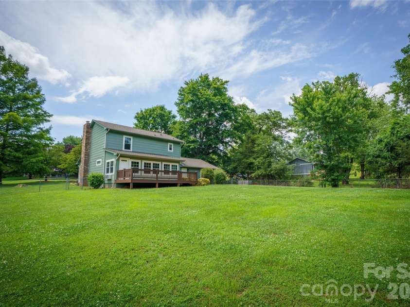 8 Wedgewood Drive, Mills River, NC 28759.  MLS# CAR4398096, YatesRealty ID 35159. Endless possibilities for this huge backyard
