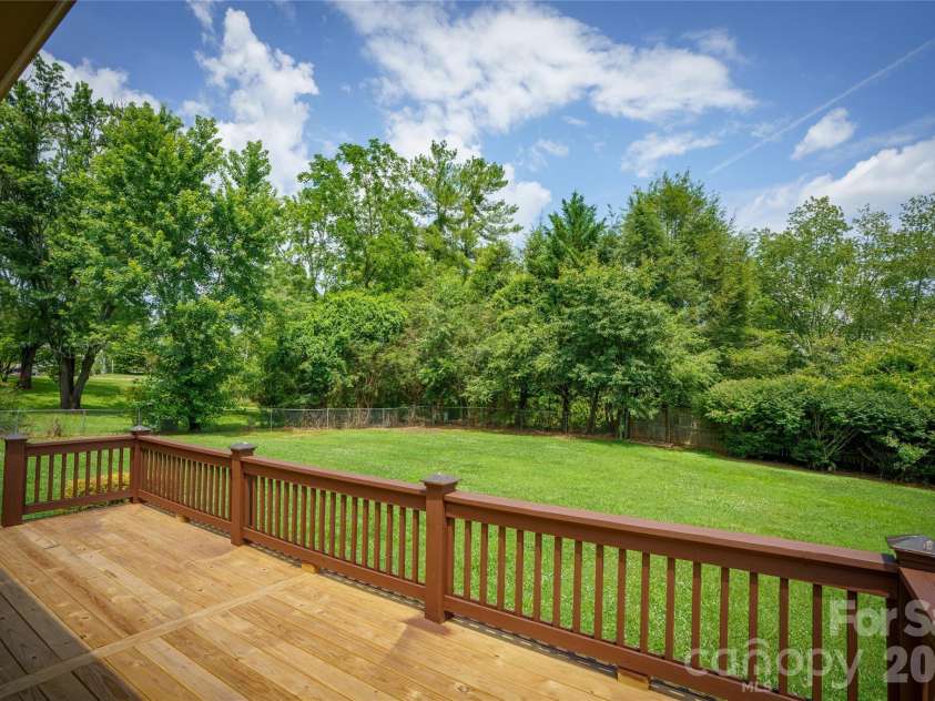 8 Wedgewood Drive, Mills River, NC 28759.  MLS# CAR4398096, YatesRealty ID 35159. Enjoy relaxing evenings overlooking your grounds