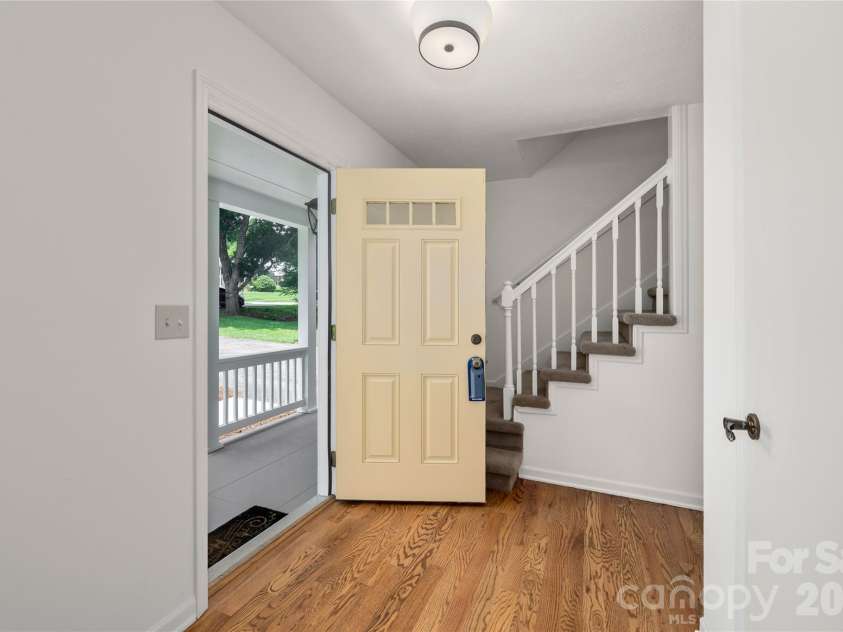 8 Wedgewood Drive, Mills River, NC 28759.  MLS# CAR4398096, YatesRealty ID 35159. Enter to the spacious foyer
