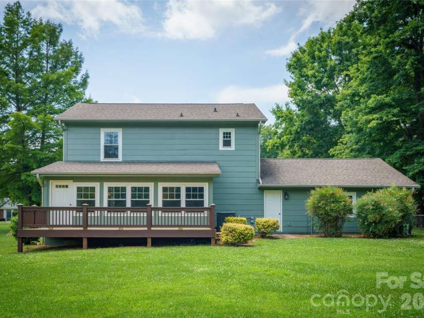 8 Wedgewood Drive, Mills River, NC 28759.  MLS# CAR4398096, YatesRealty ID 35159. Huge deck for entertaining