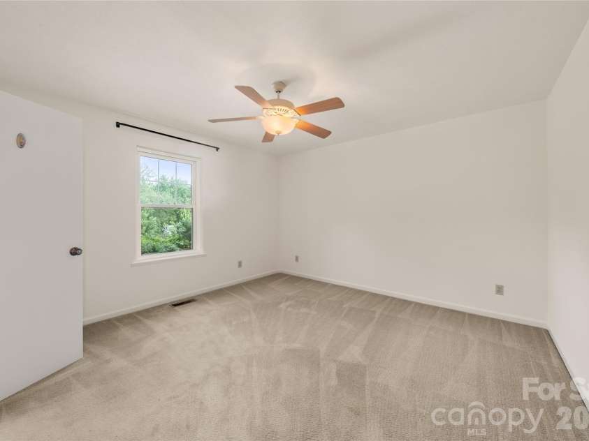 8 Wedgewood Drive, Mills River, NC 28759.  MLS# CAR4398096, YatesRealty ID 35159. Primary bedroom