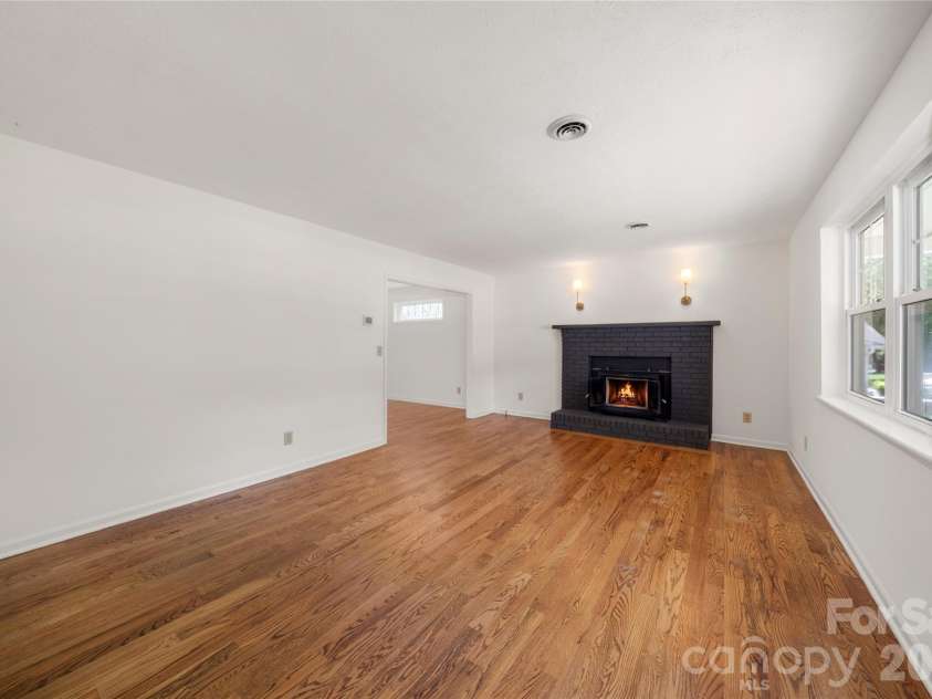 8 Wedgewood Drive, Mills River, NC 28759.  MLS# CAR4398096, YatesRealty ID 35159. So much room in this spacious living area