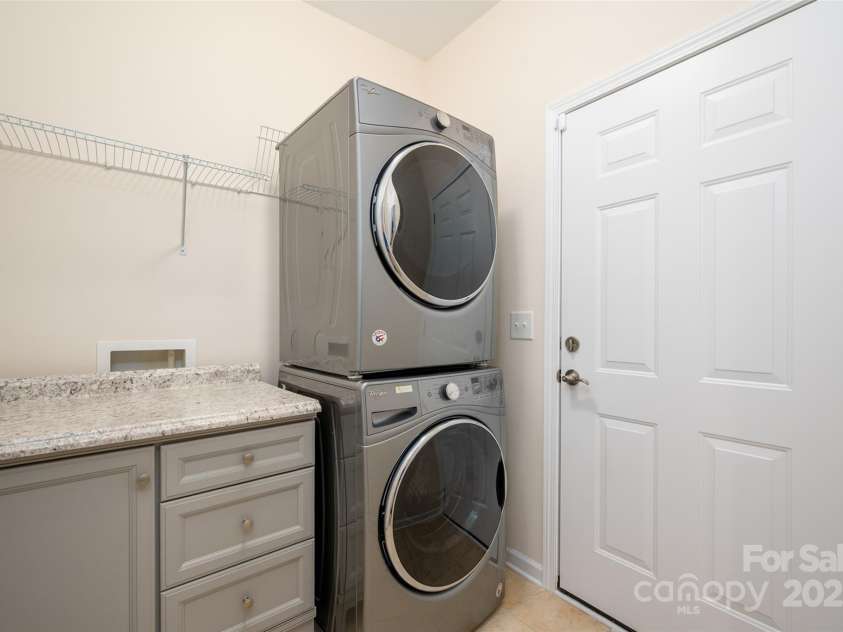 2050 Aberdeen Lane, Indian Land, SC 29707.  MLS# CAR4294584, YatesRealty ID 35161. Laundry Room With Folding Table/Cabinet