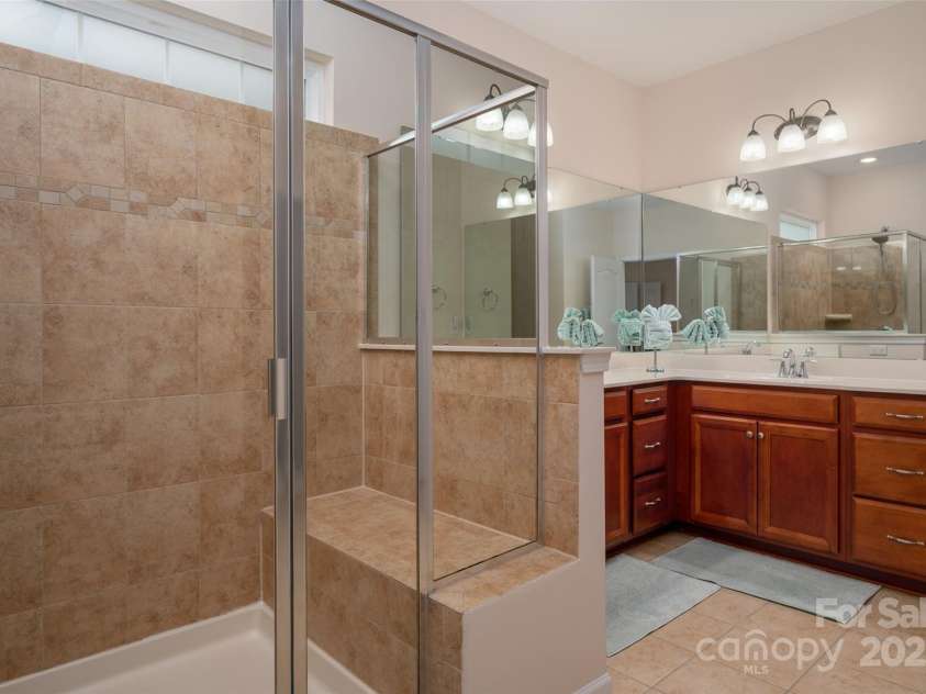 2050 Aberdeen Lane, Indian Land, SC 29707.  MLS# CAR4294584, YatesRealty ID 35161. Primary Bath Ensuite with Large Walk in Shower with built in bench