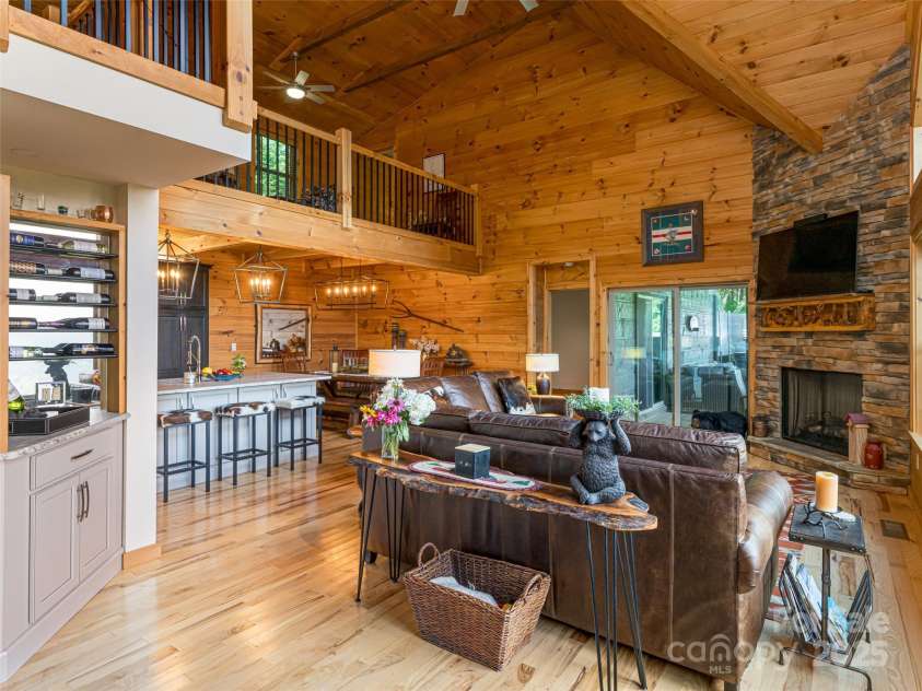 82 Gadohi Trail, Maggie Valley, NC 28751.  MLS# CAR4283632, YatesRealty ID 35163. 2-story great room