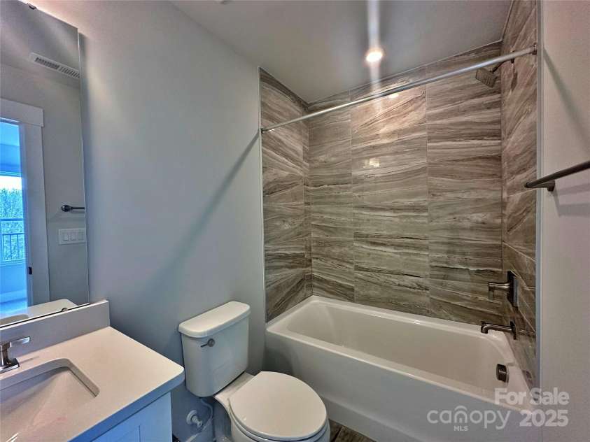 2035 Clarksdale Drive, Charlotte, NC 28206.  MLS# CAR4227622, YatesRealty ID 35165. Fourth Floor Guest Bath