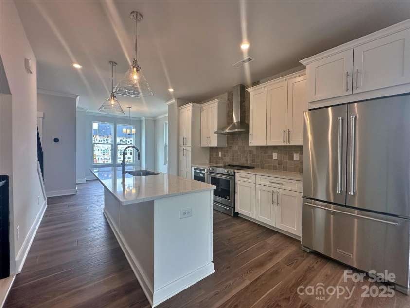 2035 Clarksdale Drive, Charlotte, NC 28206.  MLS# CAR4227622, YatesRealty ID 35165. Quartz Counters, Range Hood, and Built-in Drawer Microwave