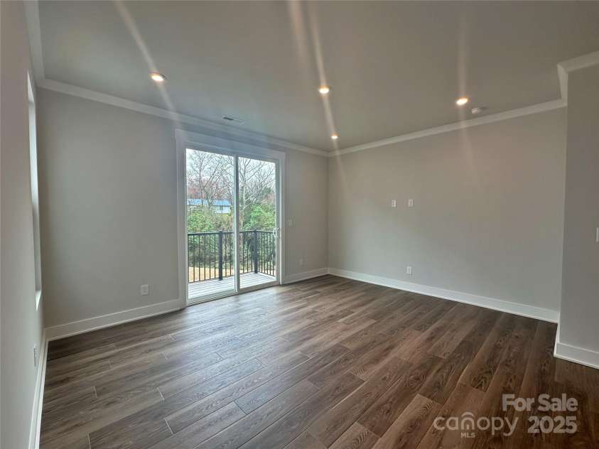 2035 Clarksdale Drive, Charlotte, NC 28206.  MLS# CAR4227622, YatesRealty ID 35165. Spacious Living Room with Loads of Light