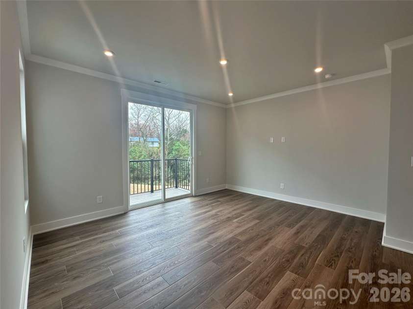 2035 Clarksdale Drive, Charlotte, NC 28206.  MLS# CAR4227622, YatesRealty ID 35165. Spacious Living Room with Loads of Light