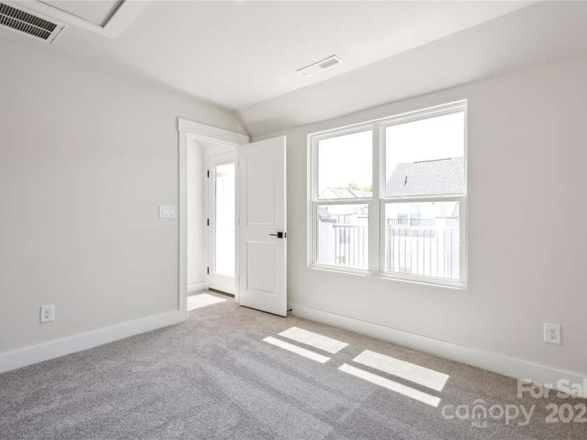2013 Clarksdale Drive, Charlotte, NC 28206.  MLS# CAR4254067, YatesRealty ID 35166. Fourth Floor Bedroom