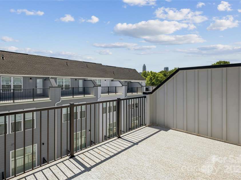 2013 Clarksdale Drive, Charlotte, NC 28206.  MLS# CAR4254067, YatesRealty ID 35166. Rooftop Terrace with Uptown Views