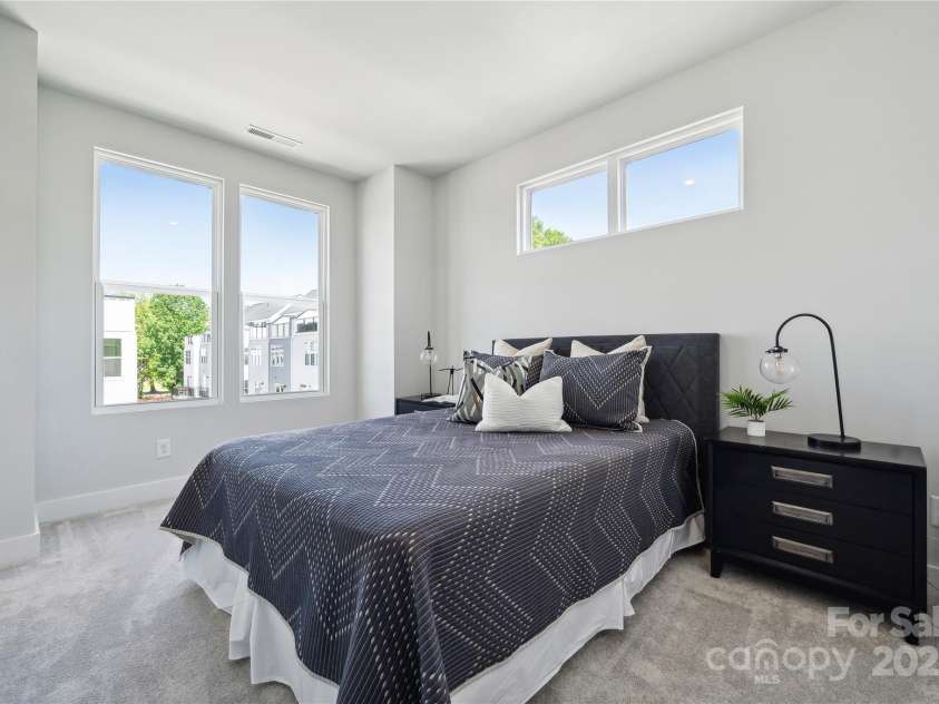 2009 Clarksdale Drive, Charlotte, NC 28206.  MLS# CAR4256471, YatesRealty ID 35167. Large Guest Bedroom with en-suite Bath