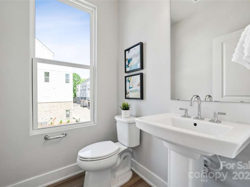 2009 Clarksdale Drive, Charlotte, NC 28206.  MLS# CAR4256471, YatesRealty ID 35167. Main Floor Powder Room