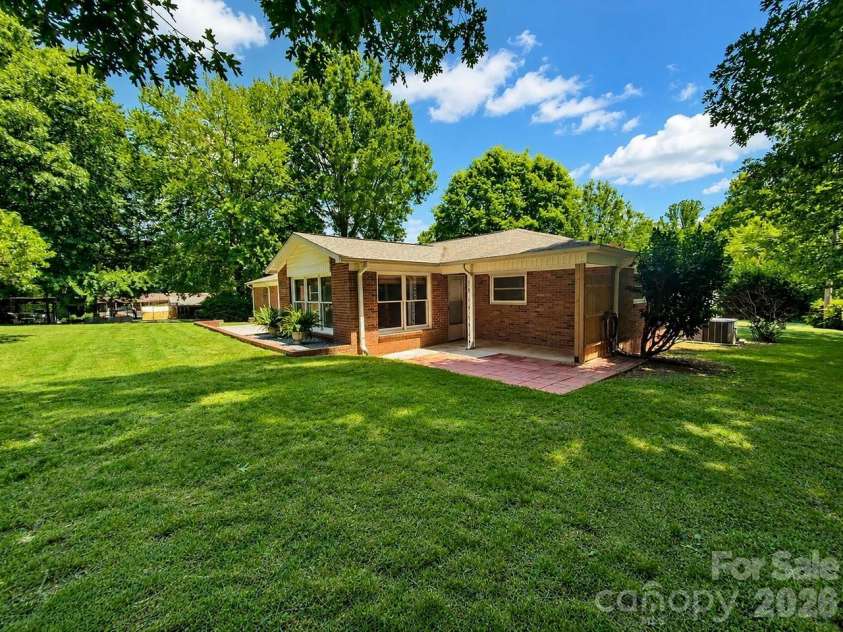 706 Hedrick Drive, Statesville, NC 28677.  MLS# CAR4399406, YatesRealty ID 35168. Additional Back Patio