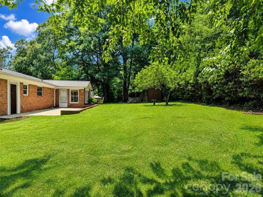 706 Hedrick Drive, Statesville, NC 28677.  MLS# CAR4399406, YatesRealty ID 35168. Beautiful Backyard
