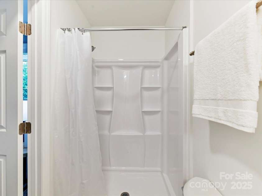 2508 Carrington Court, Charlotte, NC 28208.  MLS# CAR4288824, YatesRealty ID 35169. Large walk in shower in the primary bath