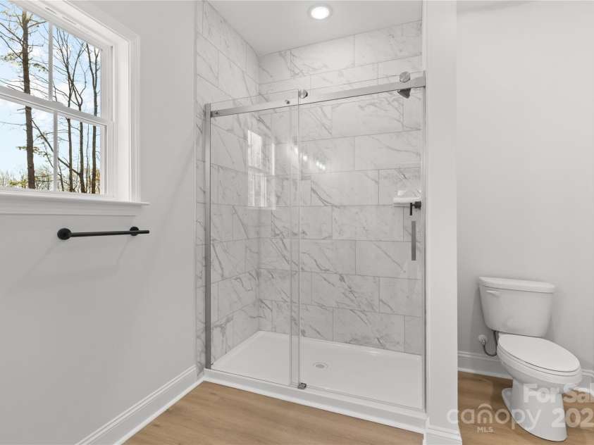 615 Stanly Street, Stanfield, NC 28163.  MLS# CAR4237967, YatesRealty ID 3517. Primary bath w/custom tile work