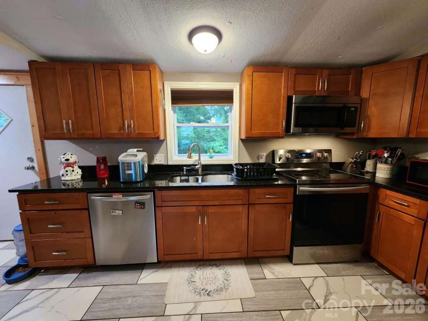 345 Hyatt Street, Waynesville, NC 28786.  MLS# CAR4399668, YatesRealty ID 35171. 