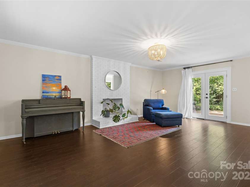 2359 Fernridge Lane, Matthews, NC 28105.  MLS# CAR4296338, YatesRealty ID 35175. Family room w/gas fireplace