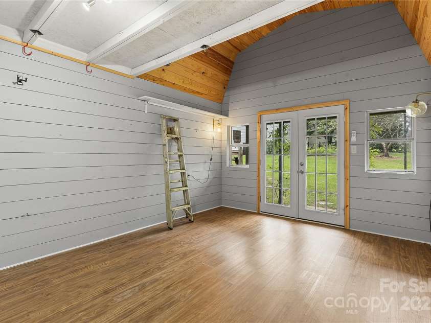2359 Fernridge Lane, Matthews, NC 28105.  MLS# CAR4296338, YatesRealty ID 35175. Inside of detached building
